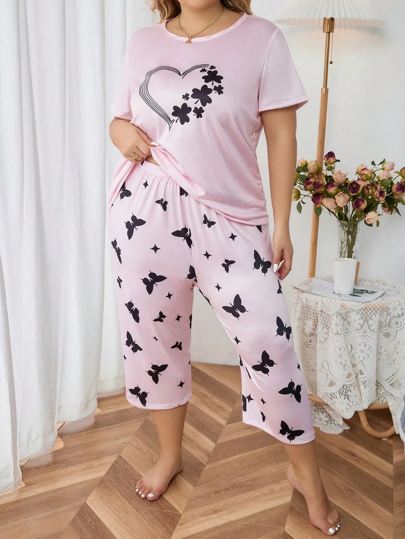 Plus size women's pink pyjamas with butterfly print