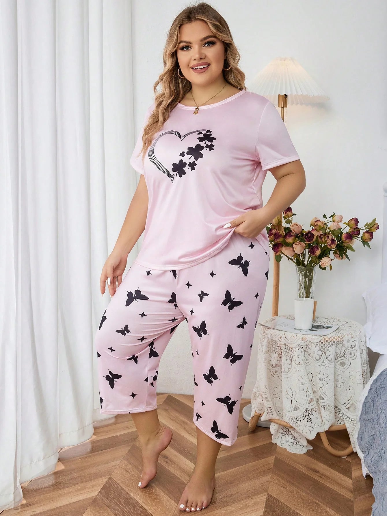 Plus size women's pink pyjamas with butterfly print